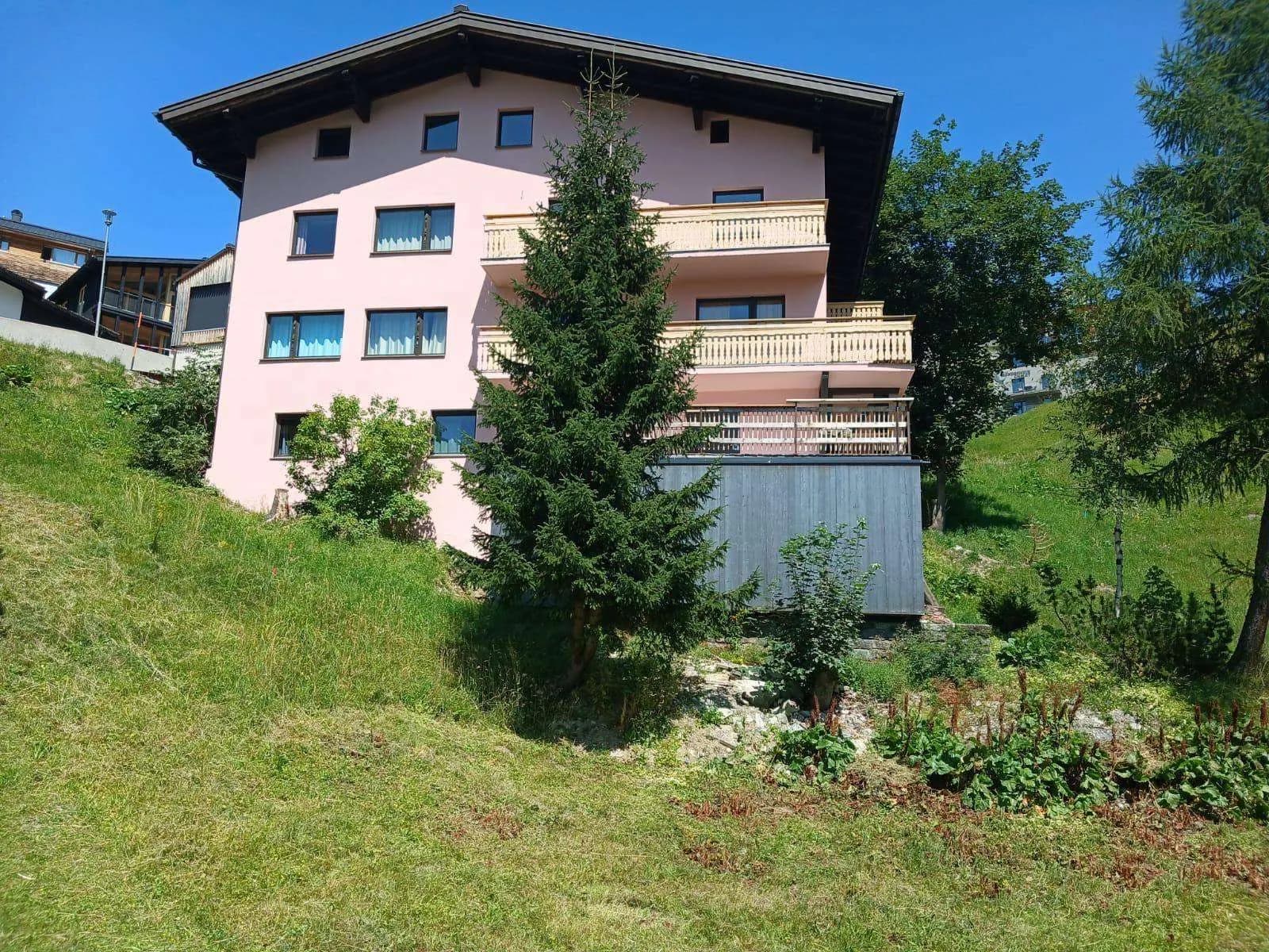 The Arlberg Motel in summer with terrace and garden