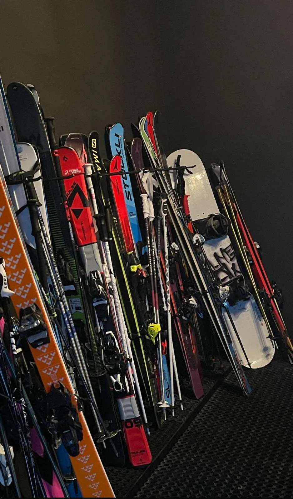 Ski room of the Arlberg Motel with skis in the racks