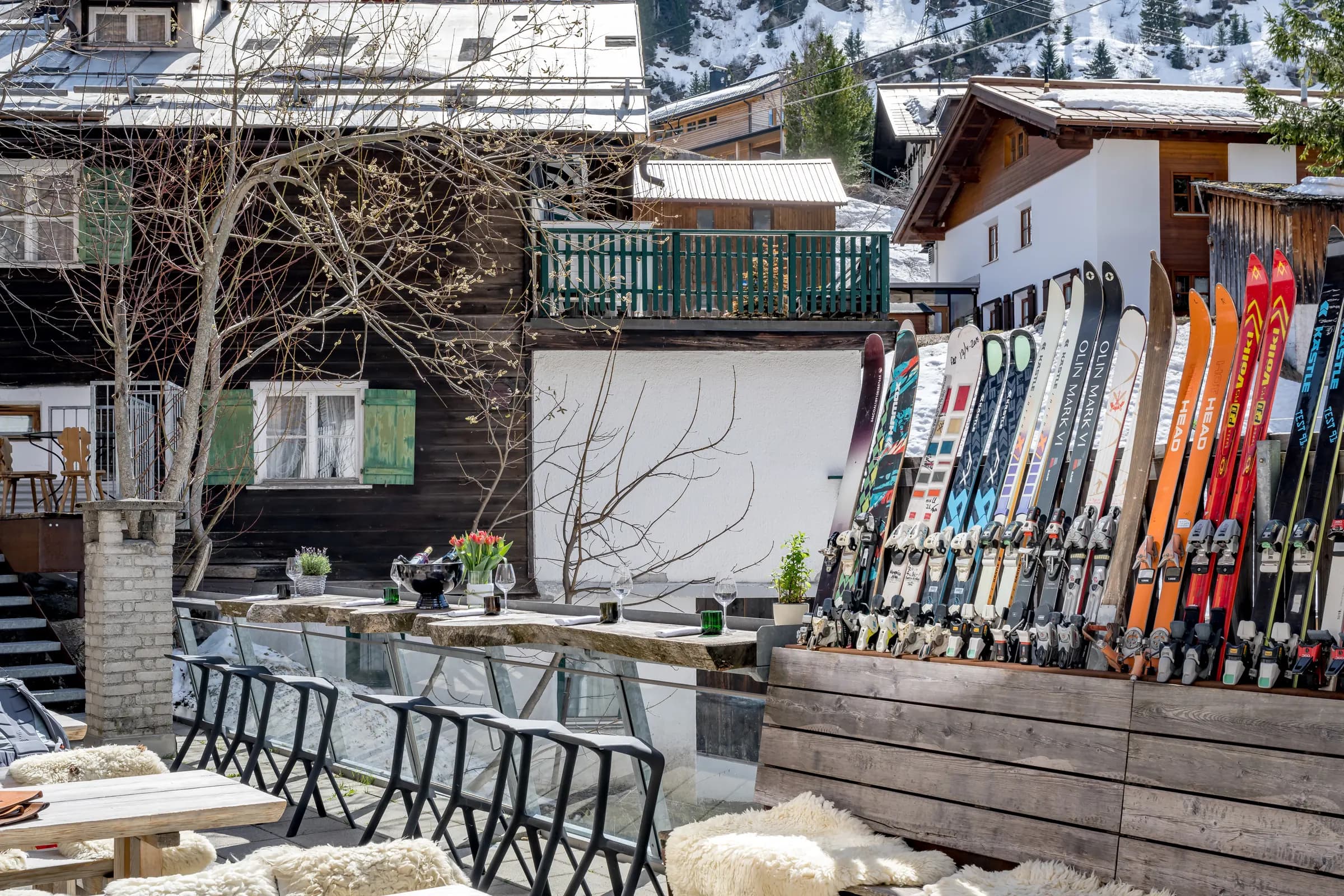 Skis against the wall beside a sun terrace